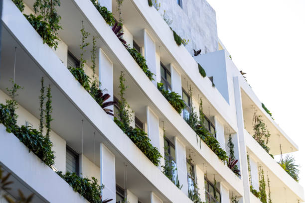 istock Closeup new, modern apartment building with vertical gardens, background with copy space 2148877324