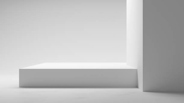 istock White podium table on white background. 3d geometrical forms walls with spotlight for design, Abstract white background product display, light and shadows. Bright copy space mock up table 2148877883