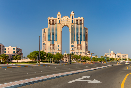 Stunning view of corniche street Abu Dhabi on a sunny day. United Arab Emirates.