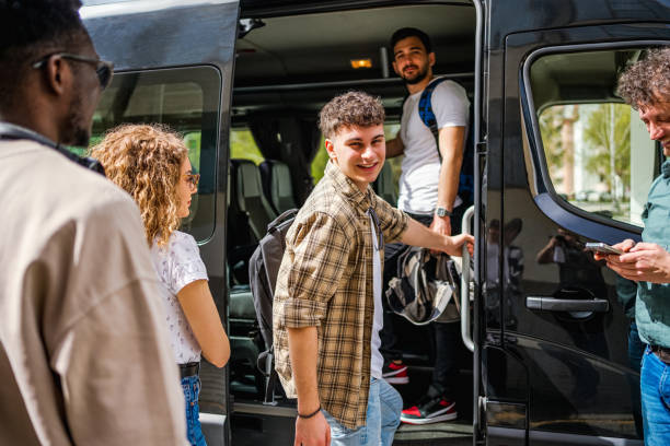 istock Young man boarding a travel bus 2148879856