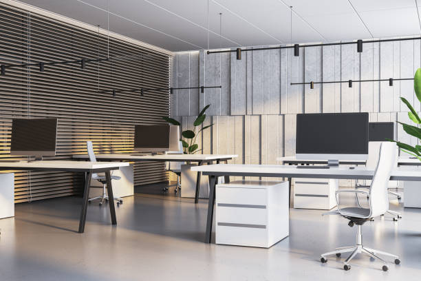 istock Stylish workspace with slatted wood partitions, concrete backdrops, and modern decor. 3D Rendering 2148882642