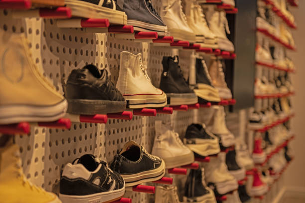 istock Shoes on display in a shoe shop. 2148883967