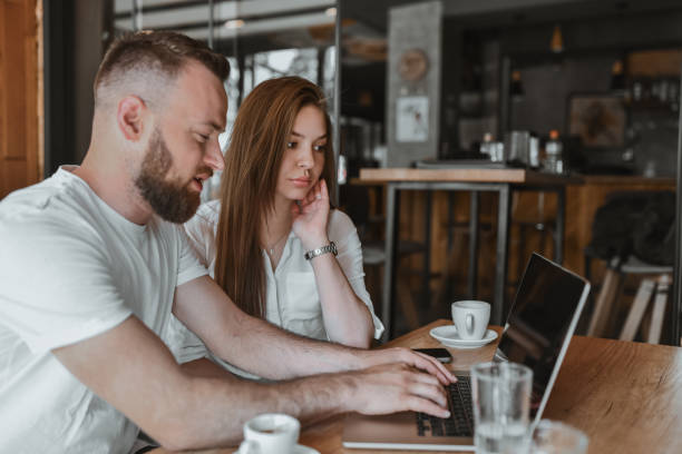 istock Private Coding Lessons For Cute Female By Bearded Male Expert 2148884465