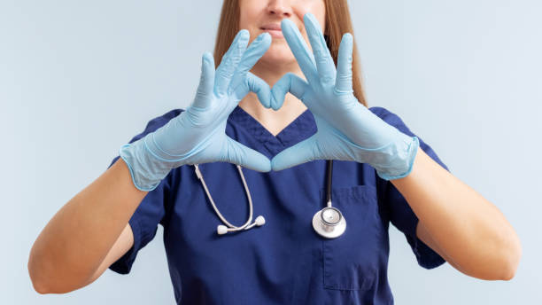 Nurse Making Heart Sign with Hands