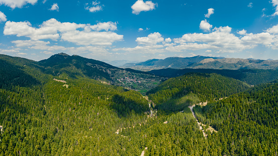 Aerial panoramic photo of Elati, Arcadia, Greece with the vast fir forest