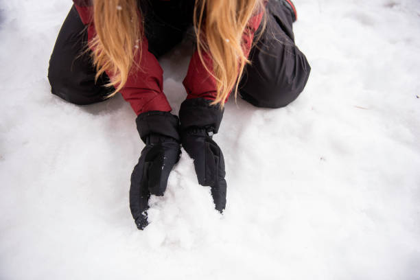 istock Mom and daughters on a winter snowy vacation 2148886803
