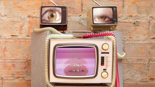 retro televisions with lips and eyes