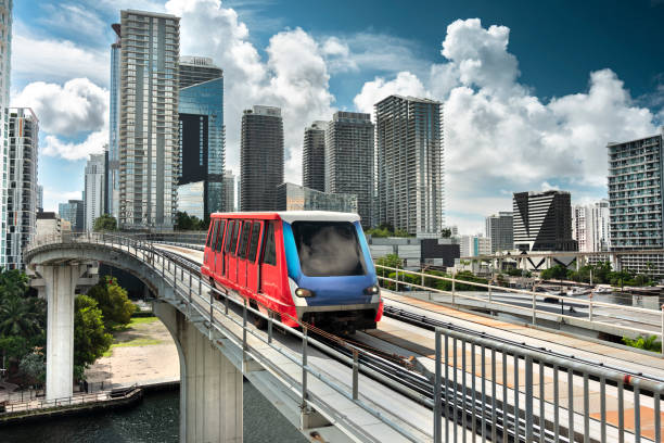 Miami Florida transit commuter train rolls on the elevated tracks