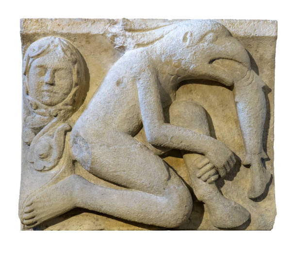 Ichthyophagus. Metope of Modena Cathedral. Modena, Italy