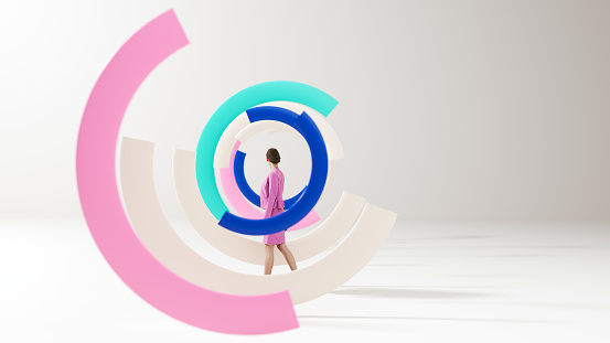 Woman walking past a three dimensional pie chart. All objects in the scene are 3D