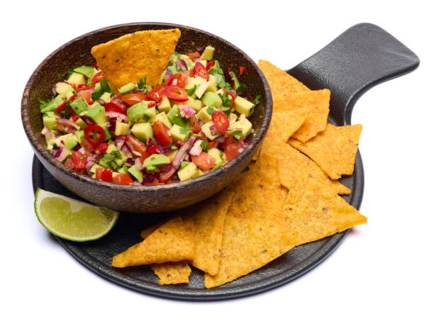 istock traditional salsa dip snack in wooden bowl and corn nacho chips isolated 2148896216