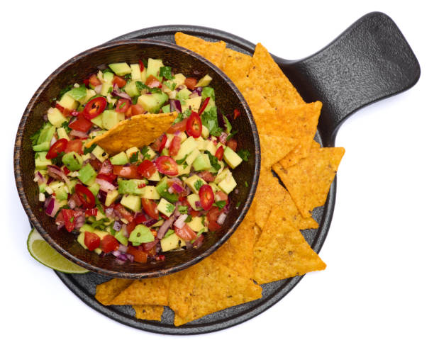 istock traditional salsa dip snack in wooden bowl and corn nacho chips isolated 2148896222