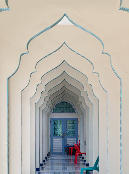 istock Interior diminishing perspective view of hallway along with gable partitions wall inside Bang O mosque. 2148897687