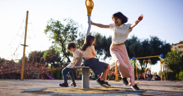 Children having fun and playing in the playground