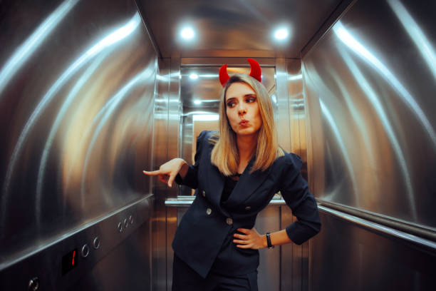 istock Devil Woman Going to the Basement with an Elevator 2148898824