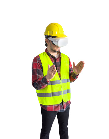 Young man wearing a Virtual Reality headset and touching on air ( the vr headset design has been changed )