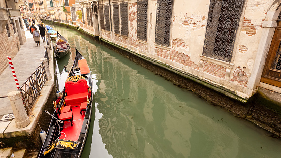 Gondola in  a Canal in Venice, Italy.