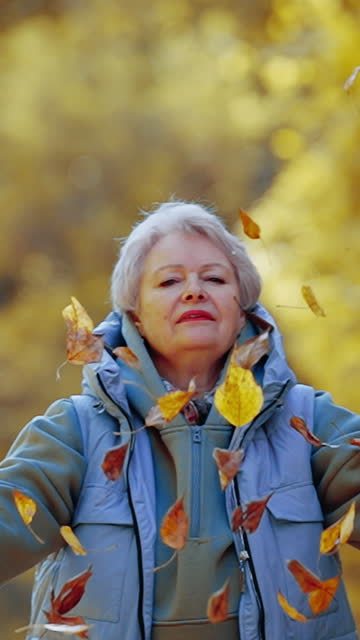 Senior woman enjoying autumn