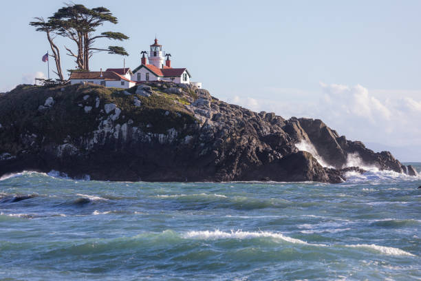 Pigeon Point Lighthouse, perched on a cliff on the central California coast, in springtime.