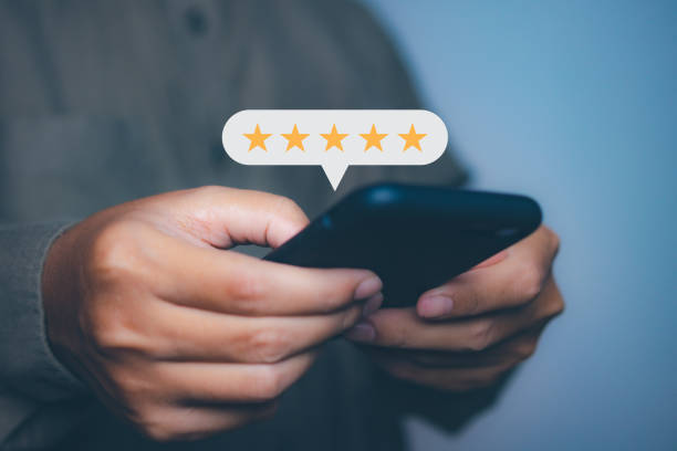istock Businessman touching giving high score for feedback review satisfaction service. Customer satisfaction experience with five star icon and excellent for feedback review satisfaction service. 2148906411