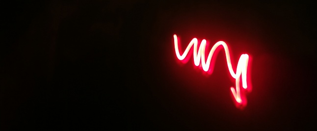 red neon lines on black background
