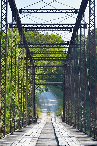 William's Bend Bridge, aka Rough Holler Bridge, is a historic steel truss bridge spanning the Pomme de Terre river near Hermitage, MO, United States, US. It was built in 1890.