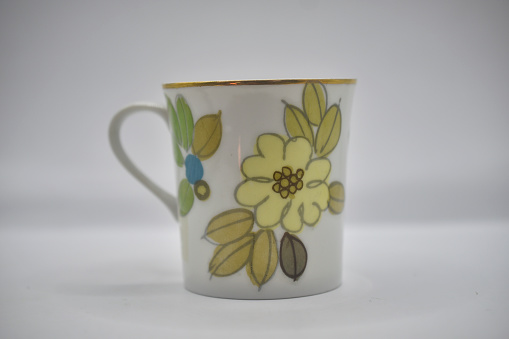 porcelain teacup with floral pattern
