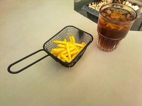 French Fries Or Fried Potato In Basket. Tea Iced In Glass. Food And Drink Menu.