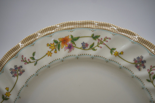 vintage porcelain plate with hand painted design