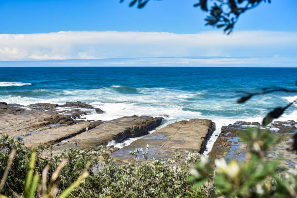 istock big waves over the rocky shore 2148910906