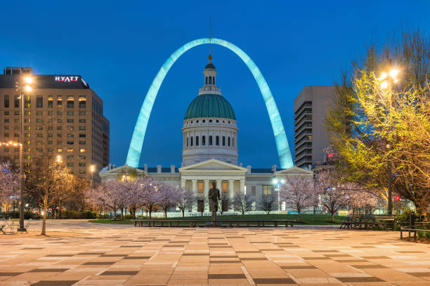 The Old Courthouse and the Gateway Arch in downtown St Louis, Missouri, USA at dawn.