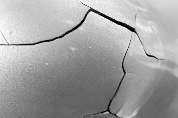 bursting and exploding sheet of metal. cracks in metal.