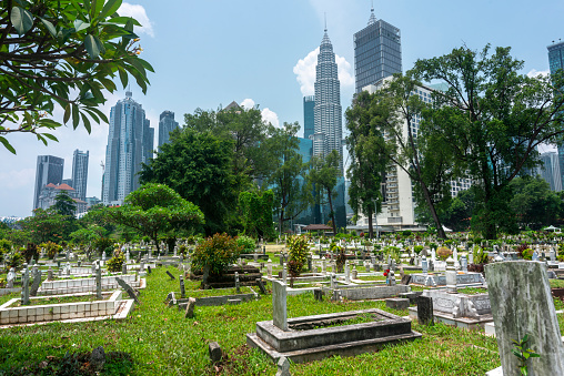 Tucked away off Jln Ampang and split from Kampung Baru by a highway is one of KL's oldest Muslim burial grounds. It's shaded by giant banyans and rain trees.