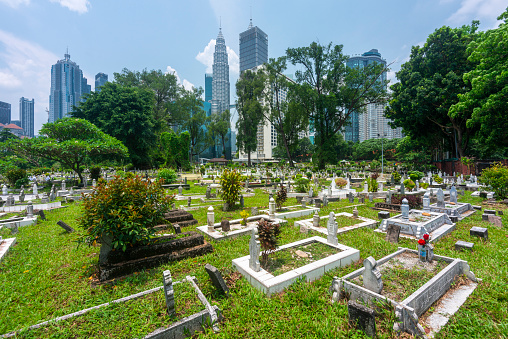 Tucked away off Jln Ampang and split from Kampung Baru by a highway is one of KL's oldest Muslim burial grounds. It's shaded by giant banyans and rain trees.