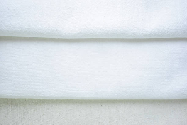istock stack of white cotton clothes, textile fashion industry 2148914174