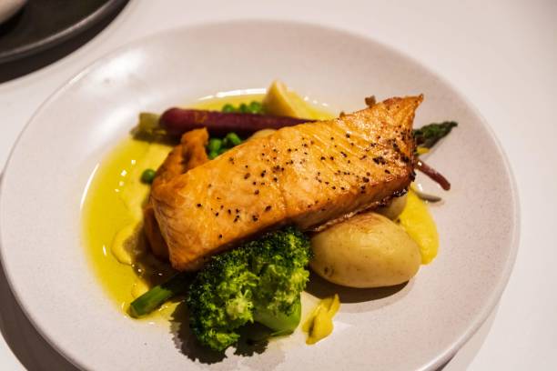 istock Grilled Salmon with Fresh Vegetables and Lemon Sauce 2148915082