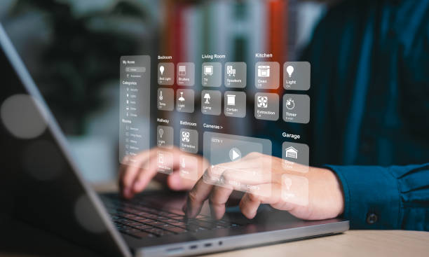 istock Effortless Home Automation, control Appliances with a laptop. Connect IoT devices via a smart intelligence dashboard for seamless automation. Streamlined house assistant technology management. 2148915157