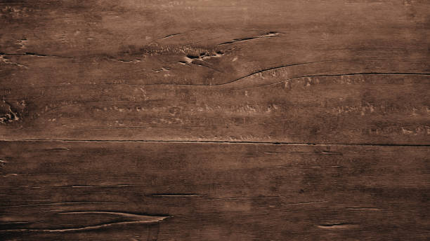 Rough and aged hardwood background with a dark brown gradient. For backdrops, banners, frames, scenes