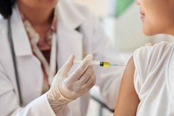 istock Medical Worker Injecting Vaccine 2148917194