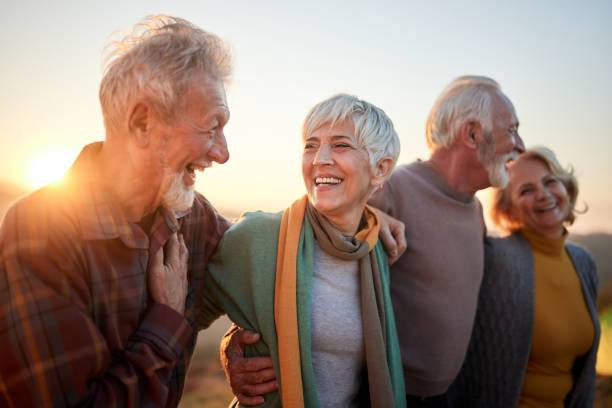 istock Happy mature couples talking while walking in autumn day. 2148922905