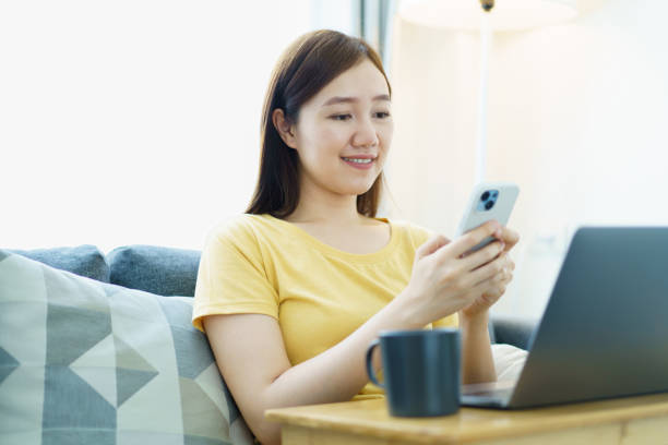 istock Woman working on laptop computer at home. 2148923145