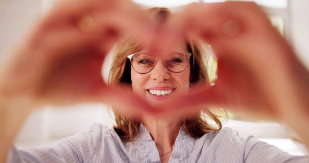 istock Woman Making Heart Sign 2148923822