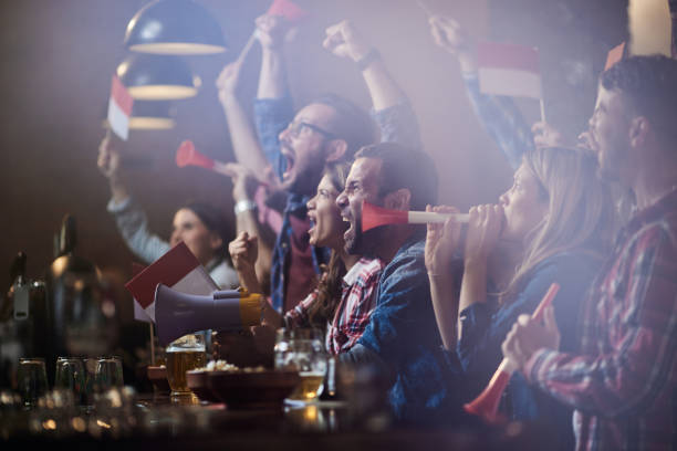 istock Celebrating match victory in a pub! 2148924036