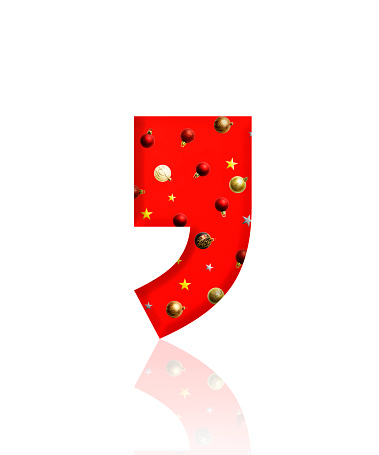 Close-up of three-dimensional Christmas ornament red Comma symbol on white background.