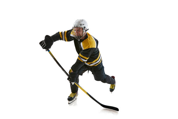 istock Focused and motivated man, hockey player wearing protective uniform and helmet, training, competing isolated on white background 2148926654