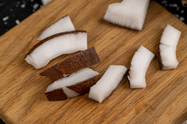 istock white coconut pulp and dried coconut flakes 2148927143