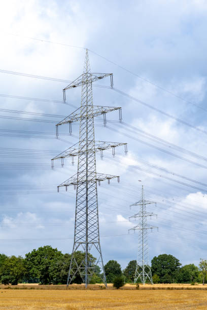 istock power lines in the field 2148927375