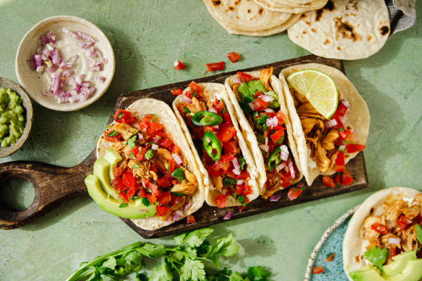 istock Homemade tacos served on table with ingredients around 2148934507
