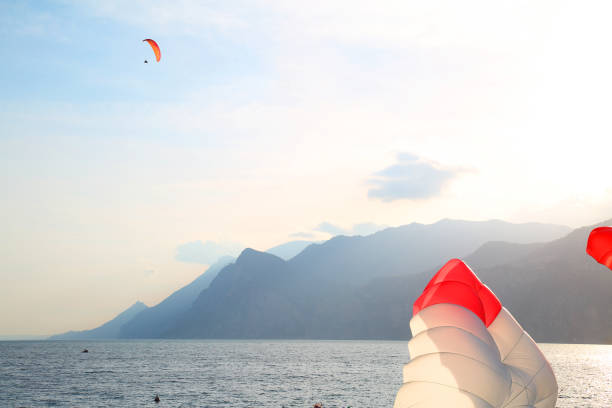 istock Paragliders on the lake Garda 2148935097