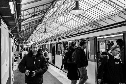 Paris, France - April 9th, 2024: Charles de Gaulle - Etoile subway station tourists taking public transport metro in Paris
